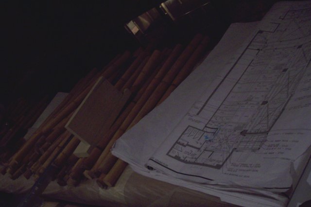 blueprint next to bamboo segments destined for the bar