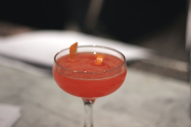 The spring menu has a lot of musical references in the titles. The \"Magnolia and Red Satin\" (Brokers Gin, Lemon, Campari, Orange Marmalade Syrup, and Orange Bitters) name comes from the song, \"Lady Marmalade.\" Maloney calls this a \"gateway campari drink.\"