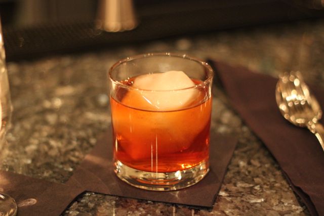Dessert was paired with the \"Makes Wide Turns\" cocktail which contains rye, Bols Genever, Aperol, vanilla-earl grey tea syrup, and old-fashioned bitters