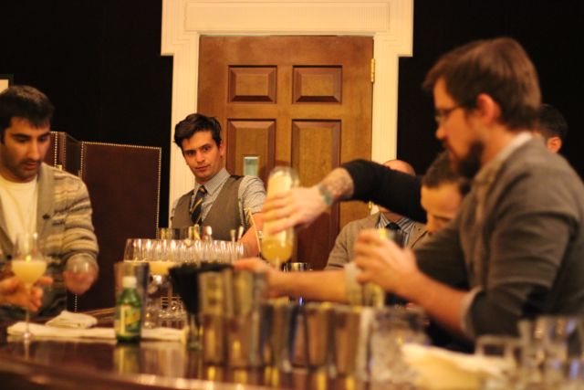 Uby Khawaja from Scofflaw works with Clint Rogers (foreground) getting cocktails ready as Thomas Mooneyham (Gage) looks on.