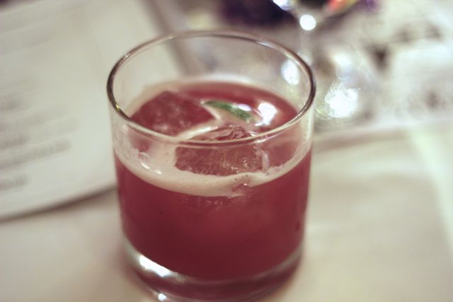 The Scarlett O\'Hara cocktail on Bourbon Street contains Southern Comfort, Lime and Cranberry juice. This cocktail was made more \"adult\" with a canned-peach infused bourbon, Todd Appel\'s Cranberry Cordial, Campari, and Lime.