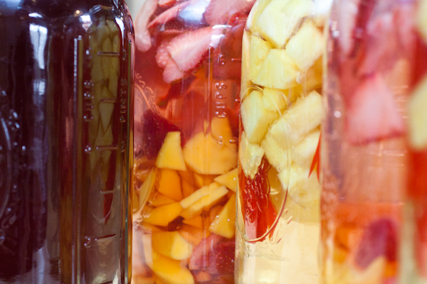Pineapple and peppers in vodka, strawberries and mango in rum.
