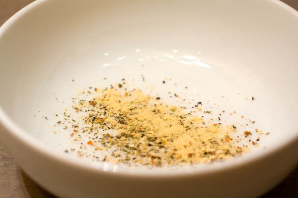A couple of twists on the salt grinder, and two shakes of the seasoning salute along with 1 or 2 dashes of mustard.