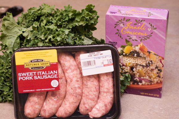 We had kale we wanted to use before it began to wilt too much.  The couscous had been lingering in the pantry for too long and while we had plans of spaghetti sauce for some of the Italian sausage, we knew we wouldn\'t be using it all.  We used 2 sausages here - sliced open and browned.