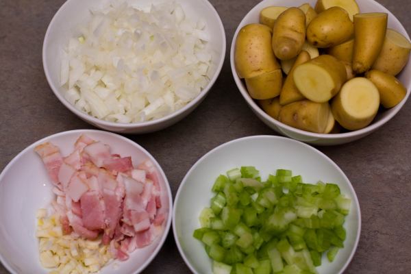 Mise en place:  Mince the onion, mince the garlic, mince the celery and cut the bacon into bite size pieces.  Cut the potatoes into 3/4 inch pieces.