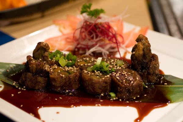 Asparagus Beef - Pan Fried asparagus wrapped with sliced beef served with Kohan Sweet Teriyaki Sauce.