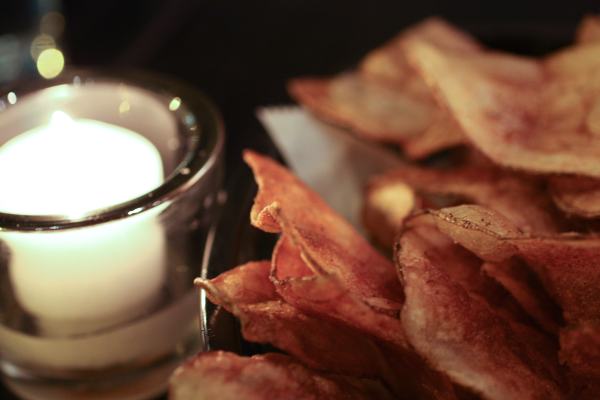 Homemade potato chips to munch while you look over the menu.
