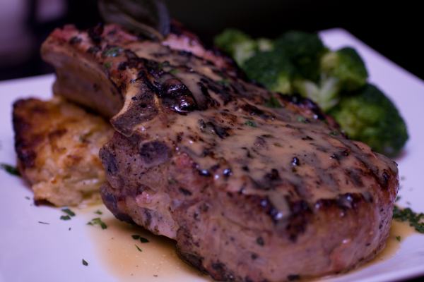 Sage rubbed Berkshire double pork chop(20 oz.) stuffed with goat cheese.