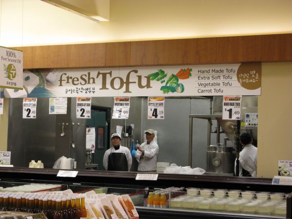 Fresh tofu is fantastic.  Right in front of this window, you\'ll find them making fresh sweet red bean snacks.