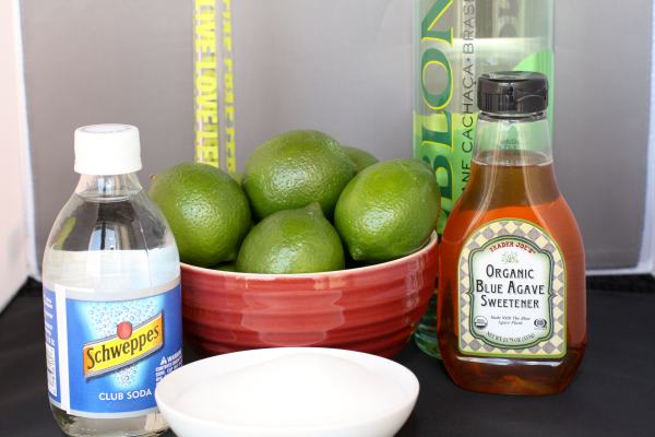 Ingredients: Limes, sugar, agave sweetener (available at Trader Joe\'s) - if you can\'t find it, skip it and don\'t fret it.  Club soda and CachaÃ§a.