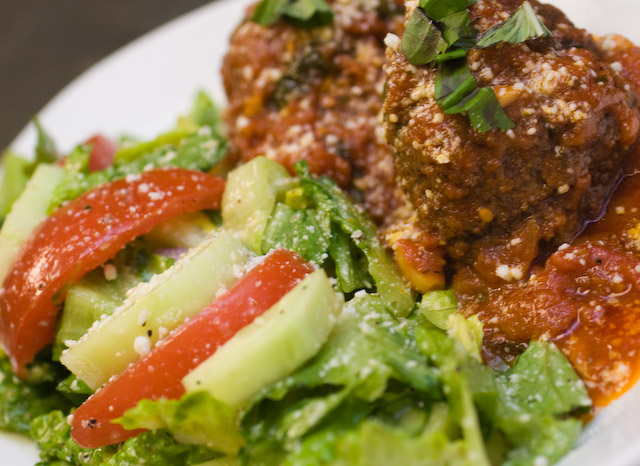 Meatballs with Romaine Salad $10.00\r\nRomaine salad tossed in a Red Wine Vinegar and Extra Virgin Olive Oil