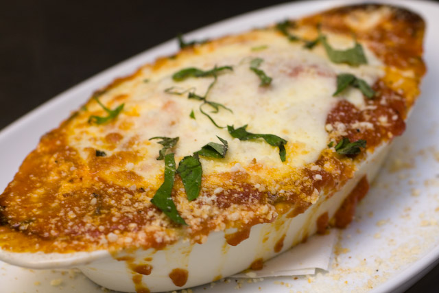 Lasagna $18.00\r\nHouse made Pasta with a hearty Meat sauce and filled with Ricotta and Provolone cheese, then baked to perfection