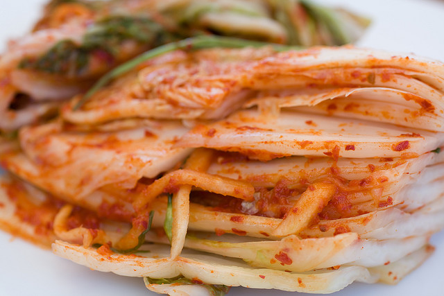 Kimchi. Layers of napa cabbage with red pepper.