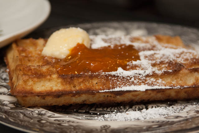 Waffle with honey butter and apricot jam.