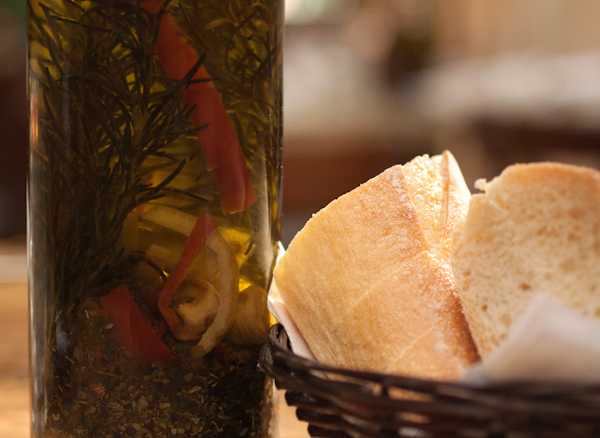 Start your meal with some warm bread and very flavorful olive oil.