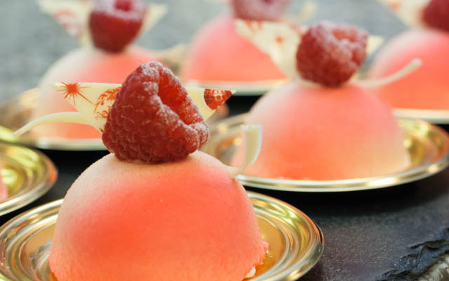 White chocolate raspberry domes for the chocolate buffet.