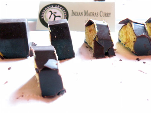 Milk Chocolate with Indian madras curry spice and coconut from \<a href=\"http://www.rrchocolats.com\"\>rr Chocolats\<\/a\>. Chef Randall Rauflaub is one of the more inventive confectioners in the city, frequently blending fresh herbs and spices into his candies.