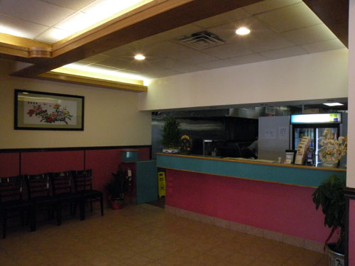 The counter area for One Two Three Express gives both eat-in and take out customers a brids-eye view of the kitchen.