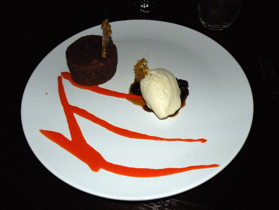 This is a molten carrot cake with a center of cream cheese and a raisin marmalade served with a sorbet.