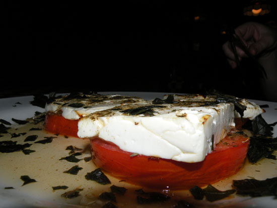 Roasted tomato served with mozzarella and liberal use of basil-infused olive oil. the roasted tomatoes were a nice touch.