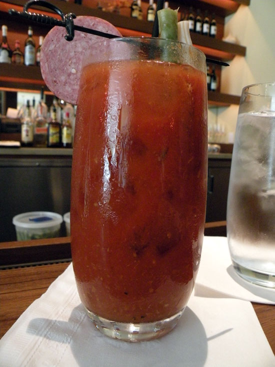 The \"red snapper\" bloody mary, made with Svedka vodka and house made bloody mary mix. It\'s a spicy cocktail; we suspect &#151 after speaking with staff &#151 that African Berber spice is used in this, as well. It\'s garnished with summer sausage and pickled beans.