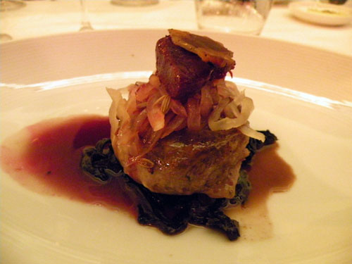 Third Course from Vie\'s Paul Virant: Roasted crepinette with Tuscan kale sauerkraut, plum and pinot noir jam, pickled onions, country bacon and pork jus. Simply our favorite dish of the evening, with flavors layered atop each other. Virant\'s fascniation with pickling and canning continues to impress us every time we eat his creations.