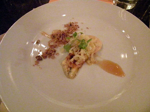 Roque River smokey blue cheese with Marcona almond and bacon fat-roasted pink lady apples, prepared by Stephanie Izard.