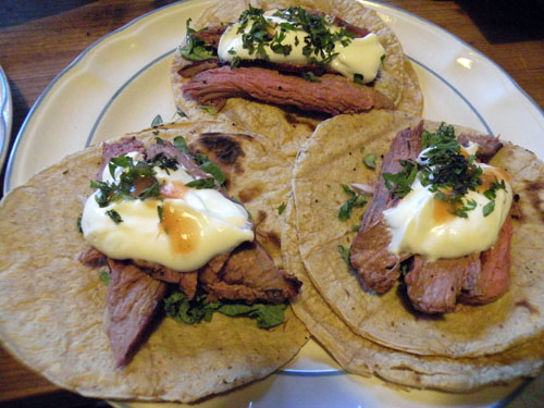 Tacos made from Heartland Meats tri-tip roast, French breakfast radishes, kale and white carrot greens