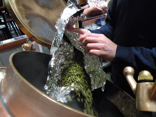 McAvena adds U.S. Brewers Gold hop pellets to the boil for spicing.