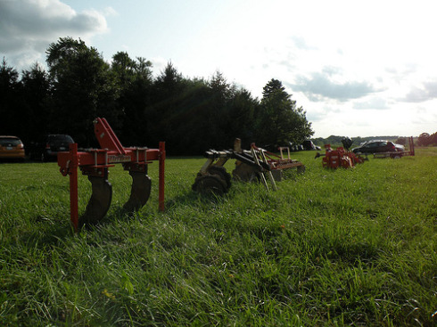 Some of the tillers and tractor attachments kinnikinnick uses.