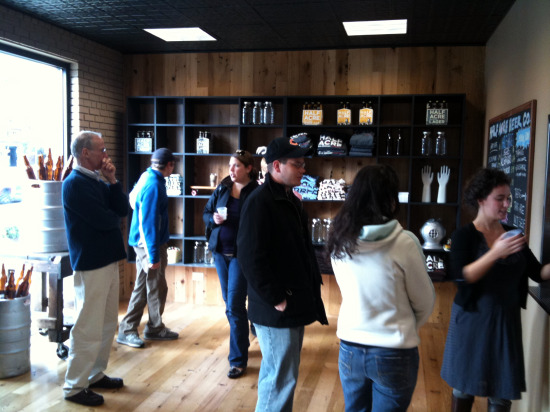 Inside the completed retail store, customers wait for samples and growlers.