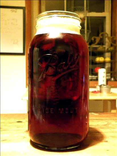 Half Acre\'s \"Buckingham Green\" Amber Ale. For growlers, they use 2-liter Ball jars.