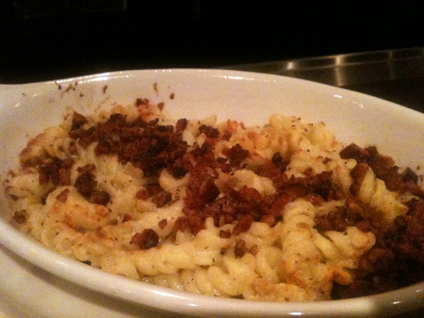 Macaroni and cheese with creamy gruyere, red onions and bacon bits. (Chuck Sudo)