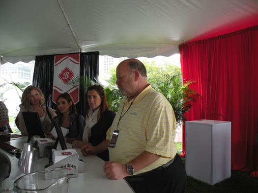 Jim Beam Master Distiller Fred Noe waxes folksy with some ladies about the making of bourbon.