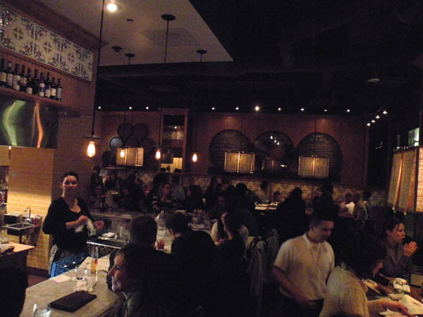 The crowd inside Purple Pig on a chilly Friday night.