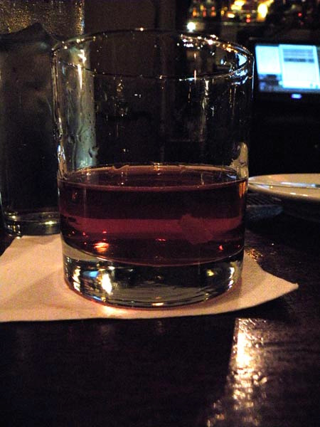 Sazerac with rye, cognac, muddles basil, and a Herbsaint rinse.