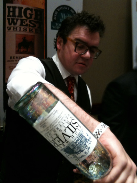 Scott Worsham of Expedition Wines & spirits pours some of High West Distillery\'s Silver whiskey, distilled from oats.