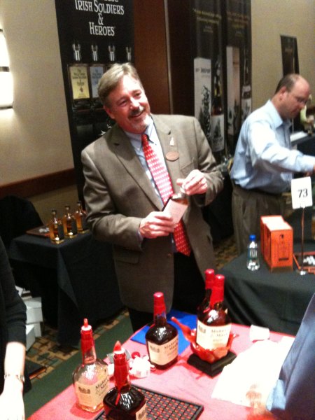 Makers Mark master Distiller Kevin Smith with a sample of the new \"46\" whisky, slated for release this summer.