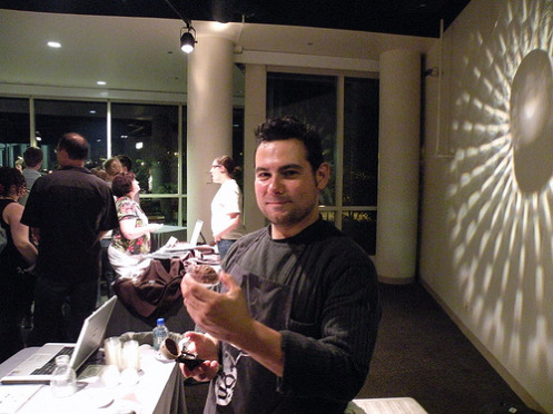 Clandestino chef/owner Efrain Cuevas holds up a sample of his dark chocolate piquin chile ice cream