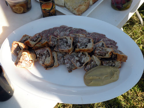 Kahan\'s pork pies and head cheese with spicy mustard, part of his contributions to the farm dinner