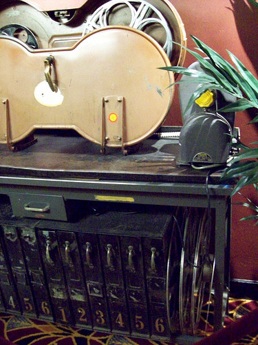 A vintage 35mm film storage table.
