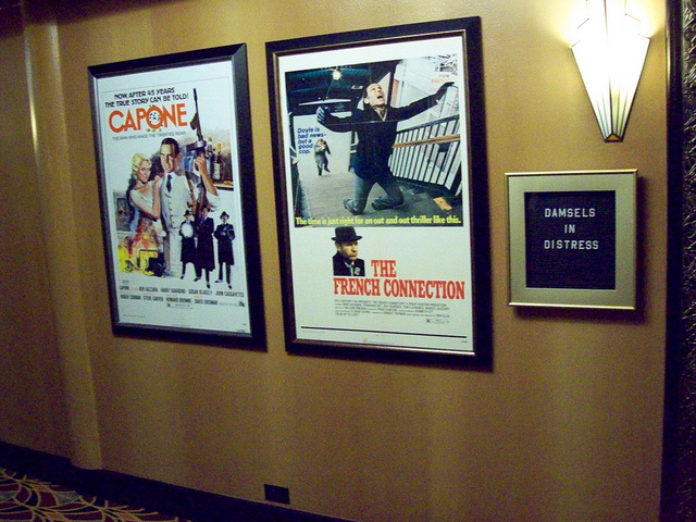 More movie posters adorn the theater\'s walls