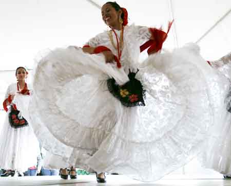 Dancers from the Mexican Dance Ensemble perform at Saturday\'s festivities.