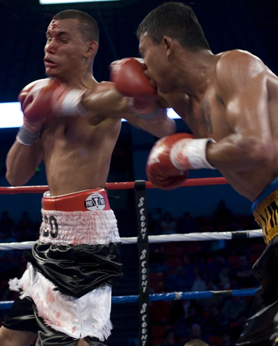 Mejia cut Estrada\'s face early in the fight, adding dramatic blood spatters to every punch.