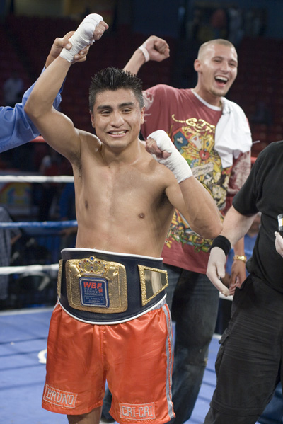 Juan Carlos Martinez being awarded the WBF Americas Lightweight Championship.