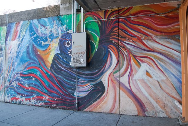 Mirtes Zwierzynski\'s original mural on 53rd Street viaduct, partially obstructed by new electrical box.