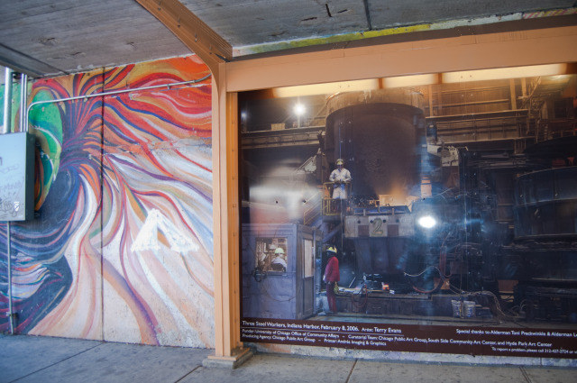 Where new meets old: Zwierzynski\'s mural is covered by temporary panels of large format digital prints of Terry Evans\'s photographs.