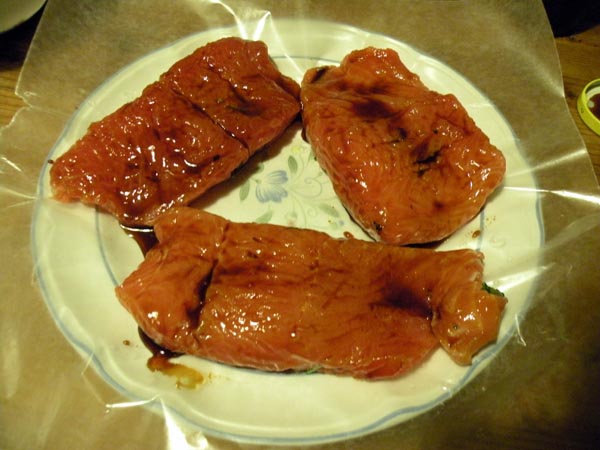 Brush the fillets with molasses.