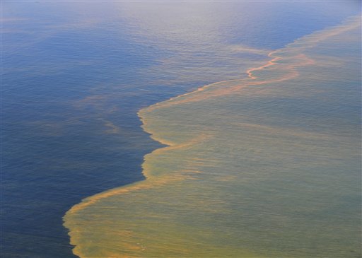 In this May 6, 2010 photo released by the U.S. Navy, oil is seen from an aerial view at the Deepwater Horizon oil spill.