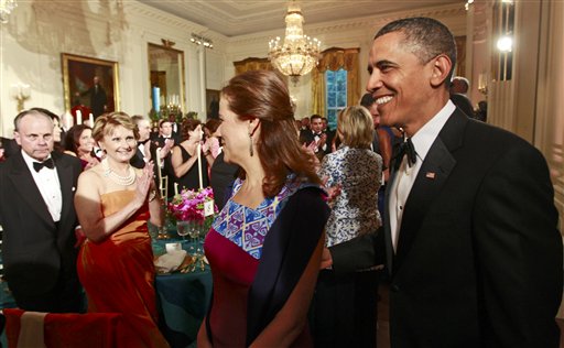 President Barack Obama escorts Mexico\'s first lady Margarita Zavala